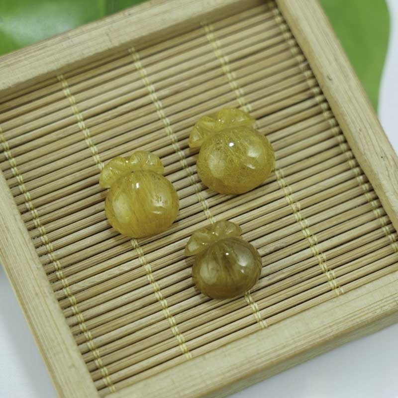 Mặt túi tiền thạch anh tóc vàng thu hút tài lộc